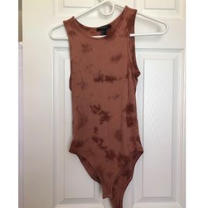 Rust tye dye onesie
